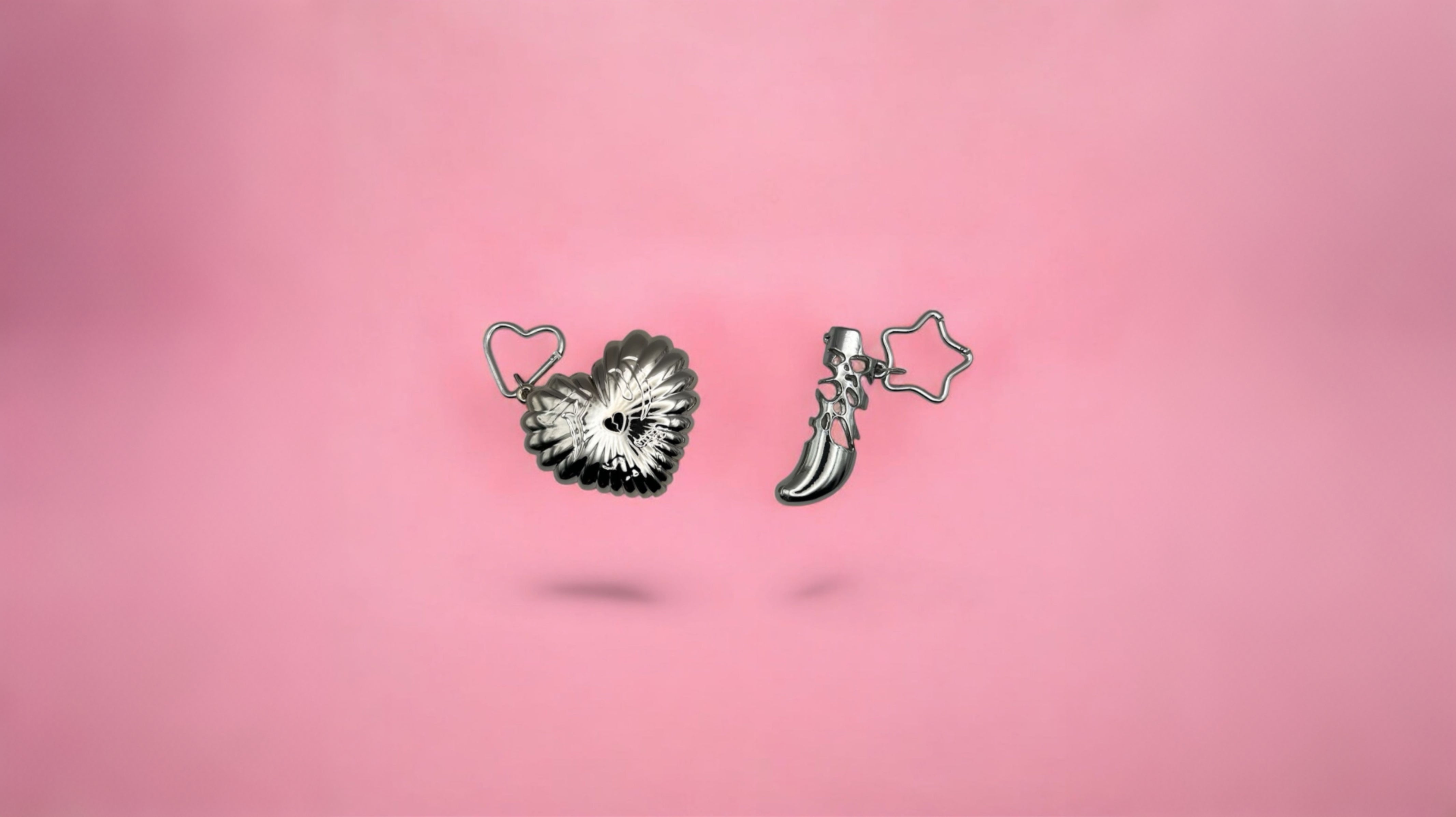 HEART ON FIRE and LUCKY STAR chrome-plated 3D-printed lighter cases floating over a soft pink background