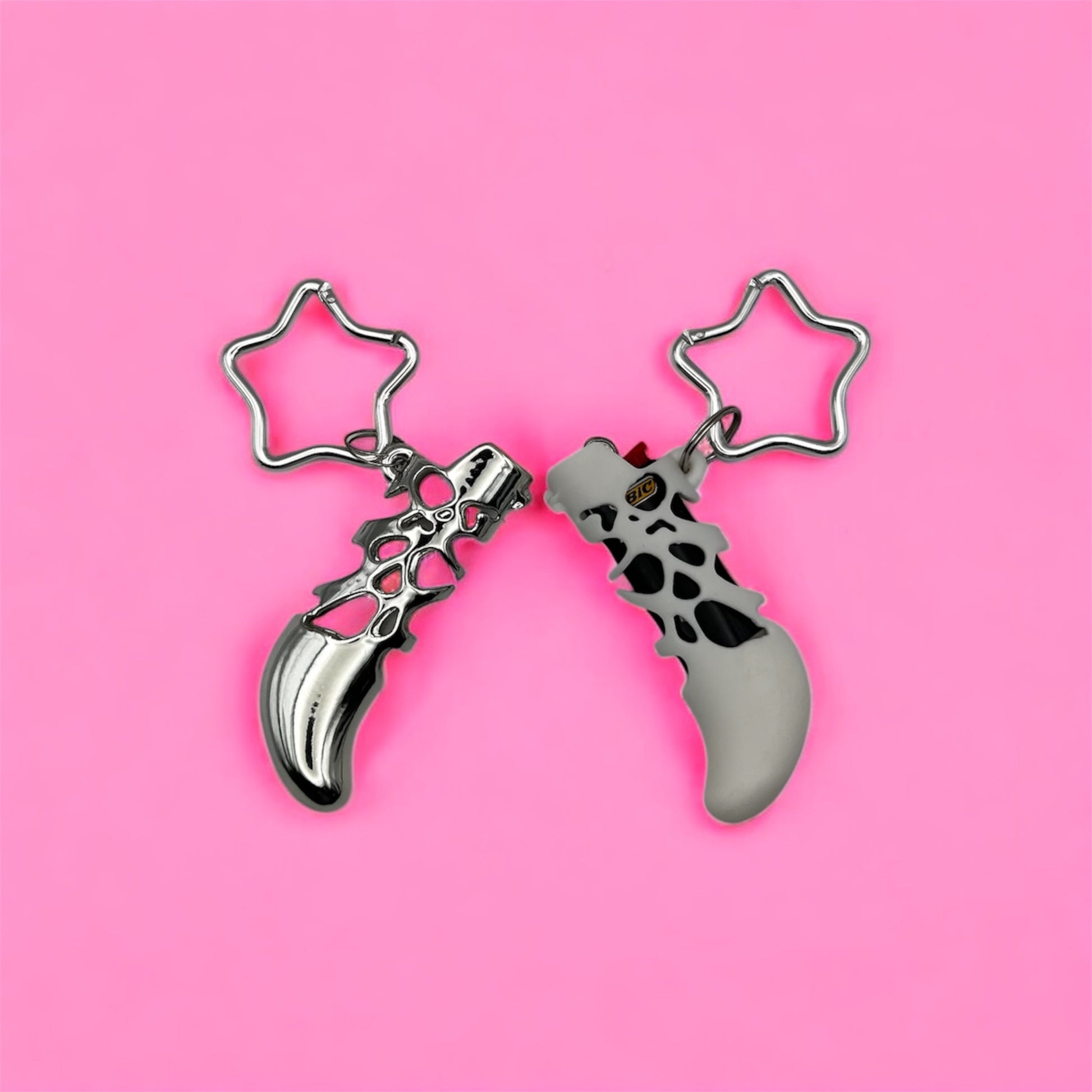 LUCKY STAR lighter case shown in chrome-plated and 3D-printed resin versions on a pink background."